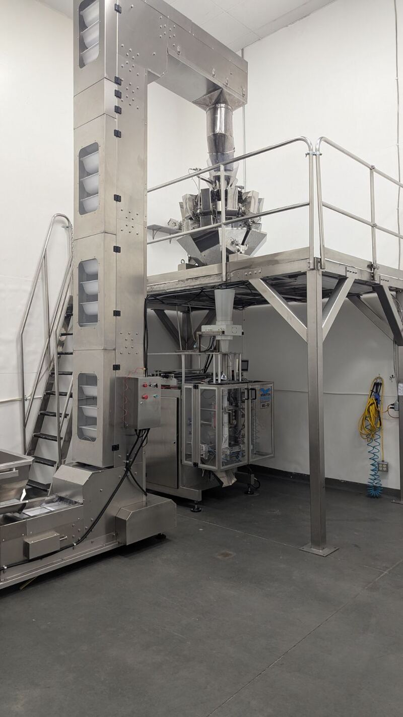 Vertical form-fill-seal packaging line